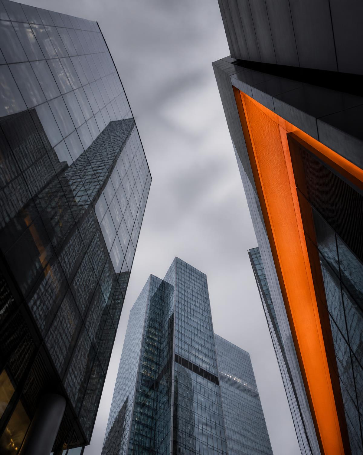 Modern towers with an orange architectural accent